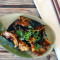 7. Chicken Dumpling with Spicy Garlic Sauce (Steam, 8pc) là suàn jī ròu jiǎo