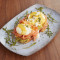 Poached eggs with smoked salmon, avocado poached eggs on a sourdough toast with hollandaise